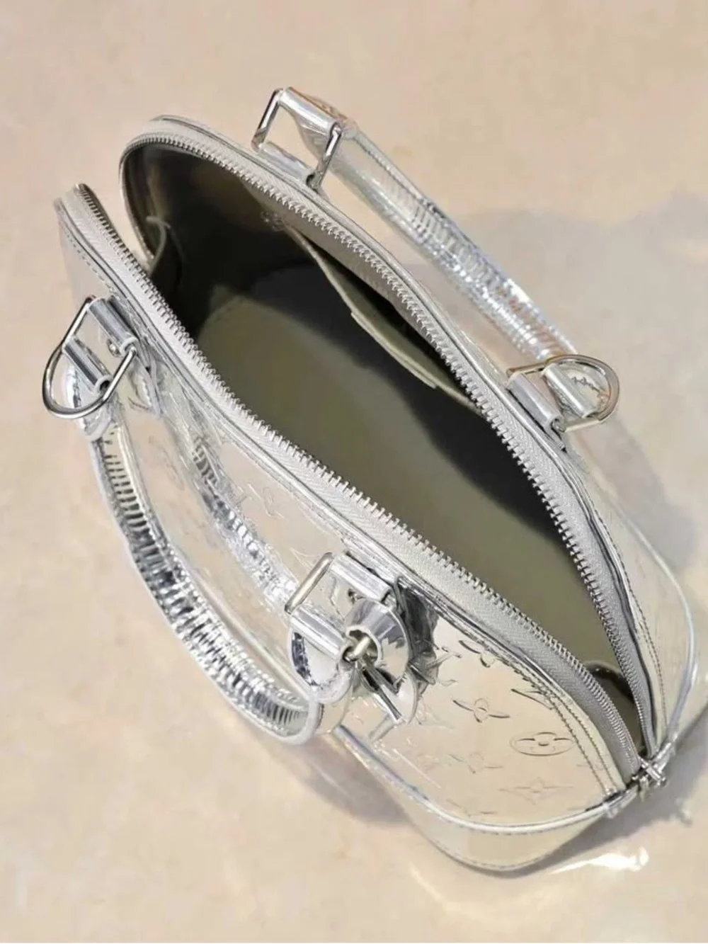 Louis Vuitton Silver Monogram Alma Satchel